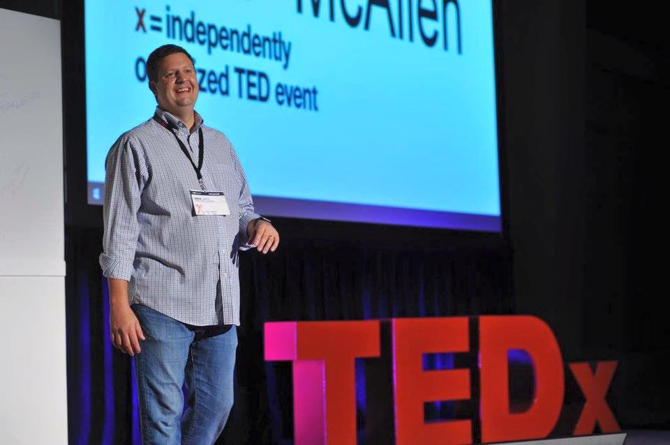 Drew Lentz speaking on the TEDxMcAllen stage